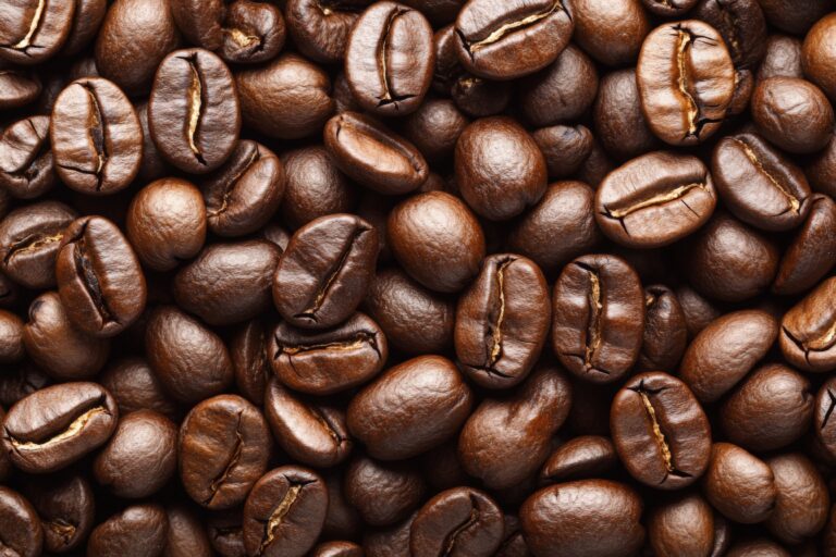 Freshly roasted coffee beans on a wooden table ready for brewing at a coffee shop in the morning