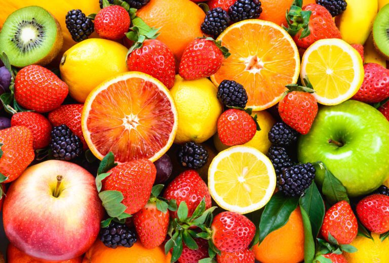 Fresh fruits mixed.Tasty fruits background.